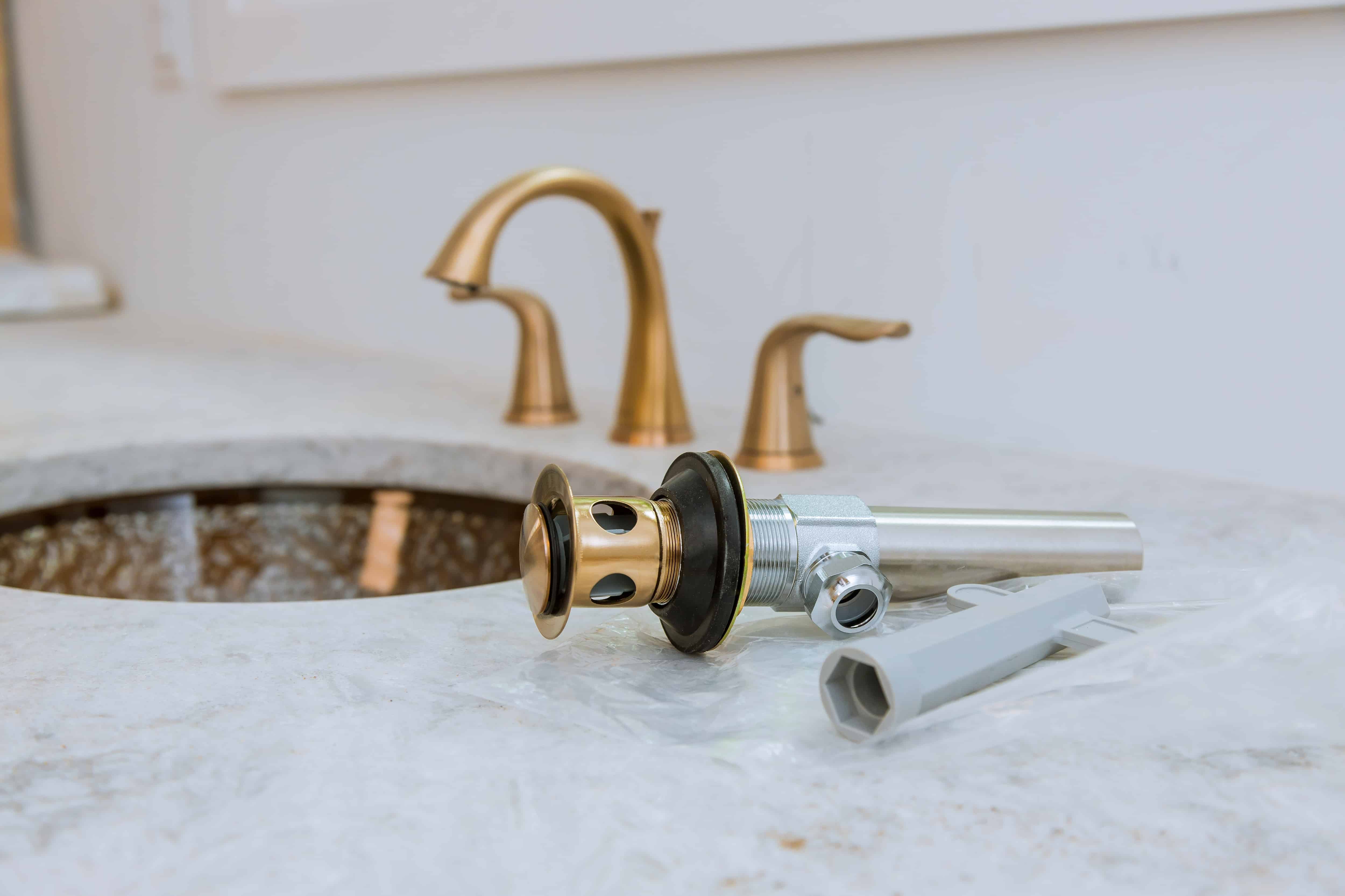 Plumbing repair service drain assemble and install bathroom sink
